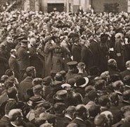 Thousands gather in Madison Square Garden, New York City, to hear radio broadcast of President Harding's speech dedicating the Tomb of the Unknown Soldier, November 11, 1921